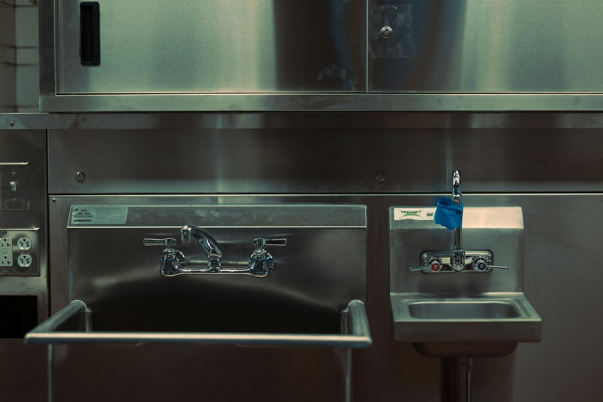 Stainless steel commercial kitchen warewashing area